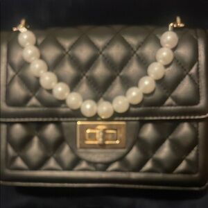 Elegant Black Quilted Bag with Pearl Accent